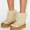 Bottes à lacets en peau lainée douce Bottes à lacets en peau lainée douce