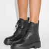 Bottes à semelles crantées T Monogram Bottes à semelles crantées T Monogram