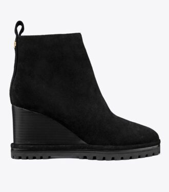 Bottes à talons compensés en daim avec semelle crantée et logo Bottes à talons compensés en daim avec semelle crantée et logo