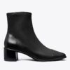 Bottines à talons bas et bout recouvert Bottines à talons bas et bout recouvert