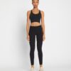 Legging sculptant à poches latérales
