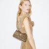 Mini sac à bandoulière Kira Turnlock en cuir de veau