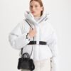 Mini sac fourre-tout Ella en cuir verni et peau lainée Mini sac fourre-tout Ella en cuir verni et peau lainée