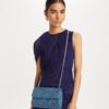 Petit sac à bandoulière convertible en denim souple Fleming Petit sac à bandoulière convertible en denim souple Fleming