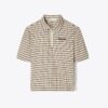 Polo demi-zip teint dans la masse Polo demi-zip teint dans la masse