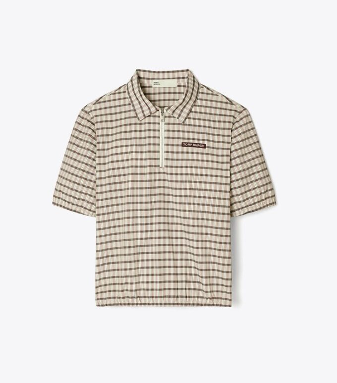 Polo demi-zip teint dans la masse Polo demi-zip teint dans la masse