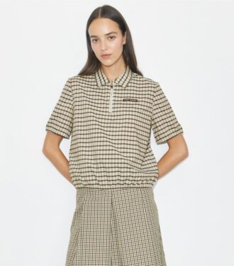 Polo demi-zip teint dans la masse