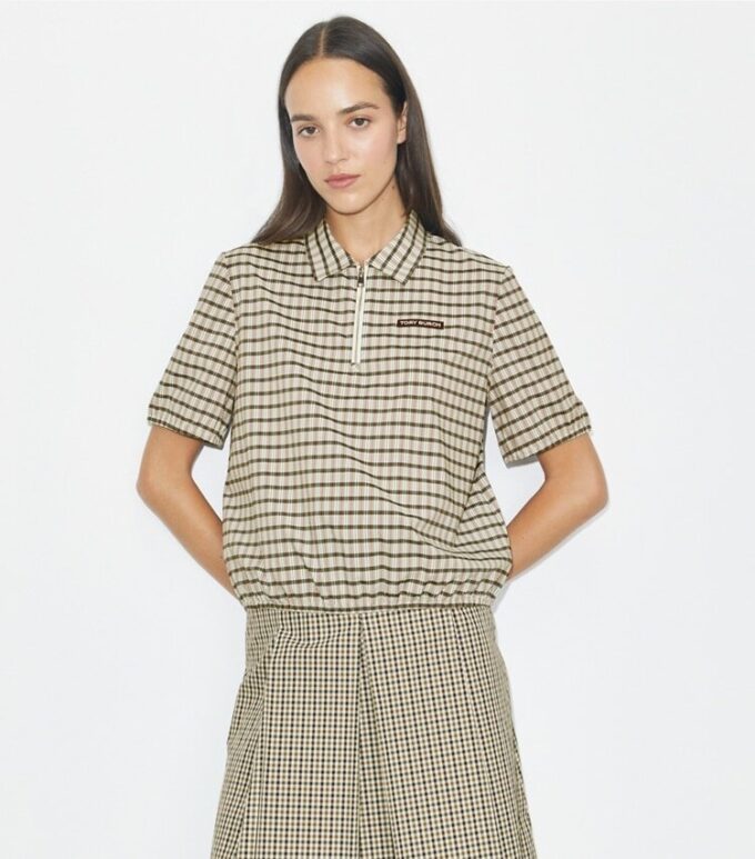 Polo demi-zip teint dans la masse Polo demi-zip teint dans la masse