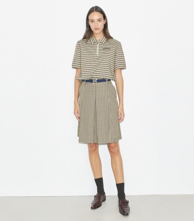 Polo demi-zip teint dans la masse Polo demi-zip teint dans la masse