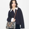 Sac cabas à poignées supérieures en cuir gaufré contrasté T Monogram T Sac cabas à poignées supérieures en cuir gaufré contrasté T Monogram T