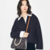 Sac cabas à poignées supérieures en cuir gaufré contrasté T Monogram T Sac cabas à poignées supérieures en cuir gaufré contrasté T Monogram T