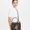 Sac seau en toile enduite T Monogram Sac seau en toile enduite T Monogram