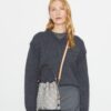 Sac seau utilitaire T Monogram Sac seau utilitaire T Monogram