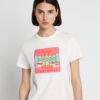 T-shirt avec patch logo graphique T-shirt avec patch logo graphique