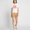 T-shirt avec patch logo graphique T-shirt avec patch logo graphique