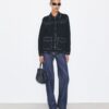 Veste en laine surpiquée Veste en laine surpiquée